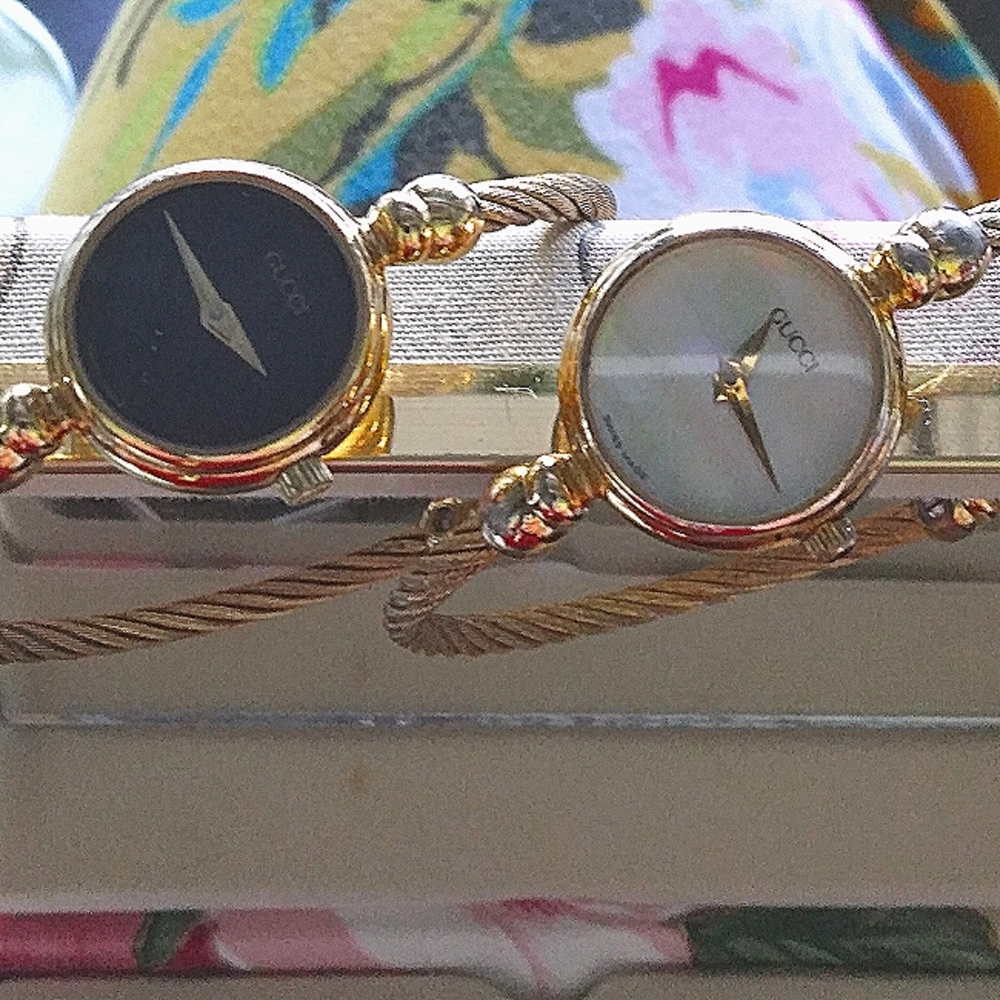 2) Females Authentic (with certificates and warranty)Gucci Gold Bangle Watch